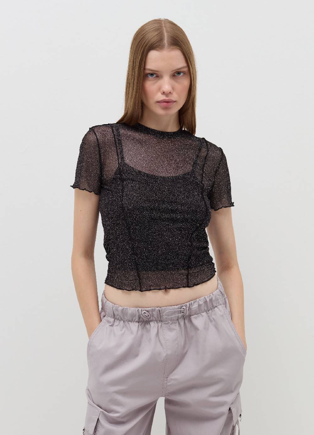 B. ANGEL T-shirt crop in mesh con profili ondulati Convenienza