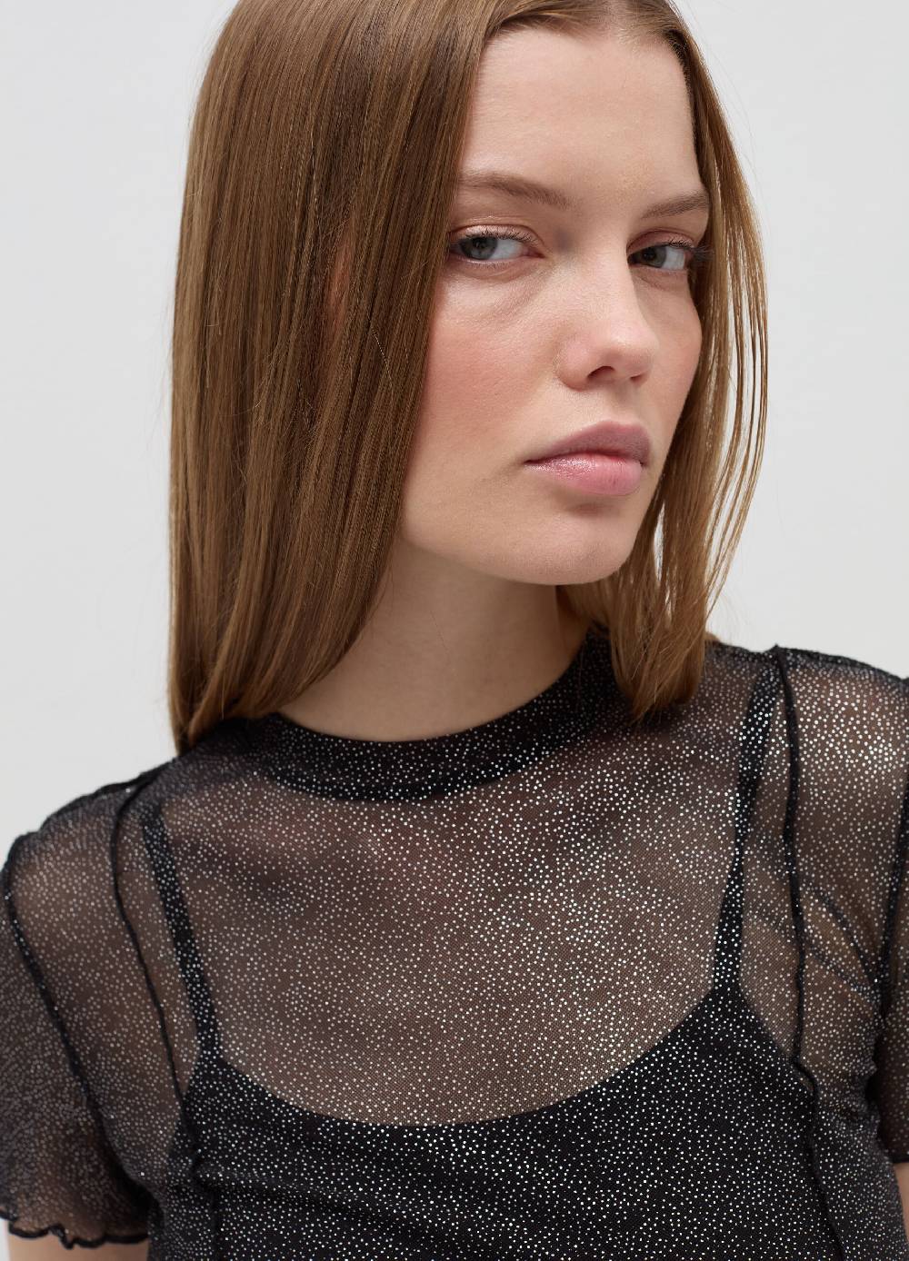 B. ANGEL T-shirt crop in mesh con profili ondulati Convenienza