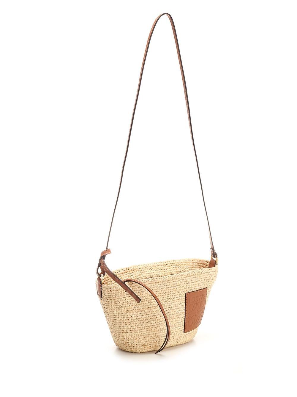 Al Duca D'Aosta Loewe Paula's Ibiza Borsa pochette "Slit" in rafia e pelle di vitello 2025